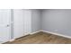 Bright bedroom features wood-look flooring and a spacious double-door closet at 103 Summerlin Dr Dr, Chapel Hill, NC 27514