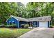 Charming single-story home with well-maintained landscaping and a welcoming driveway at 103 Summerlin Dr Dr, Chapel Hill, NC 27514