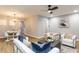 Open-concept living area with modern decor, a dining area, and stylish furniture at 103 Summerlin Dr Dr, Chapel Hill, NC 27514