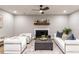 Elegant living room with fireplace, comfortable seating, and modern accents at 103 Summerlin Dr Dr, Chapel Hill, NC 27514