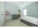 The bedroom has grey walls and is decorated with rainbows, unicorns, and little stars at 1041 Pemberly Ave, Morrisville, NC 27560