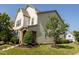 Landscaped home with lawn, bushes and tree on a corner lot with 'Coming Soon' sign at 1041 Pemberly Ave, Morrisville, NC 27560
