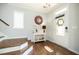 Entrance foyer with hardwood floors, a decorative mirror, and a staircase at 1041 Pemberly Ave, Morrisville, NC 27560