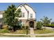 Charming home featuring manicured landscaping, stone accents, and a welcoming front porch at 1041 Pemberly Ave, Morrisville, NC 27560