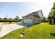 Two car garage with attached home on a large manicured lawn at 1041 Pemberly Ave, Morrisville, NC 27560