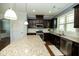 Contemporary kitchen featuring granite countertops, stainless steel appliances, and ample cabinet space at 1041 Pemberly Ave, Morrisville, NC 27560