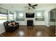 Comfortable living room with a cozy fireplace and built in shelving and cabinets at 1041 Pemberly Ave, Morrisville, NC 27560