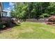 Expansive backyard with a wooden deck, perfect for relaxation and entertaining at 105 Everam Ct, Chapel Hill, NC 27516