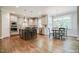 Spacious kitchen featuring stainless steel appliances, granite countertops, and an island with seating at 105 Everam Ct, Chapel Hill, NC 27516
