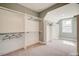Spacious walk-in closet with built-in shelves and rods, ready for organization at 105 Everam Ct, Chapel Hill, NC 27516