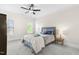 Cozy bedroom with a comfortable bed, soft carpet, and inviting natural light, perfect for restful nights at 106 Garrison Farm Rd, Mebane, NC 27302