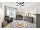 Adorable Bedroom with gray furniture, a charming alphabet rug, and ample natural light at 106 Garrison Farm Rd, Mebane, NC 27302