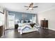 Charming bedroom featuring a cozy bed, soft natural light, and ample space for relaxation and rest at 106 Garrison Farm Rd, Mebane, NC 27302