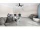 Bonus room features a cozy seating area, playful decor, and ample space for activities at 106 Garrison Farm Rd, Mebane, NC 27302