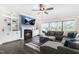 Bright and open living room with large windows offering views of the backyard at 106 Garrison Farm Rd, Mebane, NC 27302