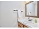 Clean bathroom with a large mirror, vanity, and neutral decor at 106 Rock Nest Ct, Morrisville, NC 27560
