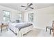Inviting bedroom with ample natural light and ceiling fan at 106 Rock Nest Ct, Morrisville, NC 27560