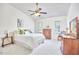 Spacious bedroom with vaulted ceiling, ceiling fan, and soft natural light at 106 Rock Nest Ct, Morrisville, NC 27560