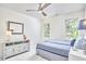 Bedroom with dresser and ceiling fan at 106 Rock Nest Ct, Morrisville, NC 27560