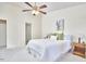 Bright, airy bedroom with a ceiling fan and two entryways at 106 Rock Nest Ct, Morrisville, NC 27560