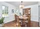 Cozy dining room with hardwood floors, crown molding, and natural light at 106 Rock Nest Ct, Morrisville, NC 27560