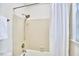 Clean shower with neutral tile and shower head at 106 Rock Nest Ct, Morrisville, NC 27560