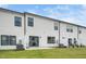 Townhome backyard with patio, privacy fence, and well maintained grass at 109 Periwinkle Pl, Clayton, NC 27527
