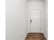 Bright hallway with modern laminate flooring at 109 Periwinkle Pl, Clayton, NC 27527