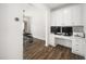 Office space features modern white cabinets, drawers and work space area at 109 Periwinkle Pl, Clayton, NC 27527