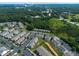 An aerial view of a townhouse community near downtown Raleigh, highlighting its proximity to the city at 1108 Renewal Pl, Raleigh, NC 27603
