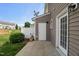 Charming backyard with a patio and door leading to the home, perfect for outdoor gatherings at 1108 Renewal Pl, Raleigh, NC 27603