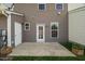 The backyard patio includes multiple door access and space for relaxation or entertaining at 1108 Renewal Pl, Raleigh, NC 27603
