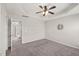 This bedroom features a decorative ceiling fan and a unique decorative wall mirror at 1108 Renewal Pl, Raleigh, NC 27603