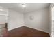 Neutral dining area offers hardwood floors, recessed lighting, and space for entertaining at 1108 Renewal Pl, Raleigh, NC 27603