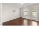Bright dining area with hardwood floors, white walls, and plenty of natural light at 1108 Renewal Pl, Raleigh, NC 27603