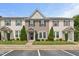 Charming townhome featuring neutral siding, black shutters, manicured landscaping, and clearly marked unit numbers at 1108 Renewal Pl, Raleigh, NC 27603