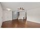 Welcoming living room with hardwood floors, a ceiling fan, and an open layout, ideal for entertaining and relaxation at 1108 Renewal Pl, Raleigh, NC 27603