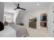 Spacious bedroom with a TV, and an organized walk-in closet at 111 Stone Park Dr, Wake Forest, NC 27587