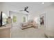Serene bedroom features neutral tones, a ceiling fan, and bright natural light at 111 Stone Park Dr, Wake Forest, NC 27587