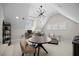 Bright bedroom with a round table, desk and modern light fixture at 111 Stone Park Dr, Wake Forest, NC 27587
