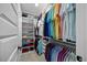 Organized walk-in closet with ample shelving and hanging space for clothing and accessories at 111 Stone Park Dr, Wake Forest, NC 27587