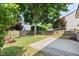 Private backyard with grass and mature trees, offering a serene outdoor space at 120 Ryder Cup Cir, Raleigh, NC 27603