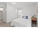 Bright bedroom featuring neutral paint, plush carpeting, and natural light at 1207 Grant St, Durham, NC 27701