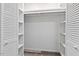 Walk-in closet with shelves and cabinets, and featuring carpet at 1207 Grant St, Durham, NC 27701