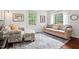 Bright living room featuring hardwood floors and ample natural light at 1207 Grant St, Durham, NC 27701