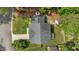 Aerial view of the house showing the roof, backyard deck, and surrounding greenery at 12117 Inglehurst Dr, Raleigh, NC 27613