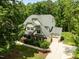 A well-maintained two-story home with a manicured lawn and an attached two-car garage at 12216 Kyle Abbey Ln, Raleigh, NC 27613