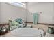 Bathroom boasting a modern soaking tub with decorative tiles, neutral walls, and ceramic tile flooring at 12216 Kyle Abbey Ln, Raleigh, NC 27613