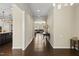 Inviting entryway with hardwood floors and views of the open-concept living space at 123 Turnstone Dr, Durham, NC 27703