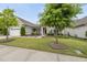 Charming home with a well-manicured lawn, two-car garage, and lovely landscaping at 123 Turnstone Dr, Durham, NC 27703